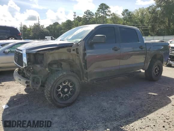 2012 Toyota Tundra с VIN 5TFDW5F12CX238361, выставлен на аукционе Copart как лот 68435805 с пробегом 230 865 миль миль и Списание • Salvage title. История ставок и продаж доступна на DreamBid. Изображение 1.