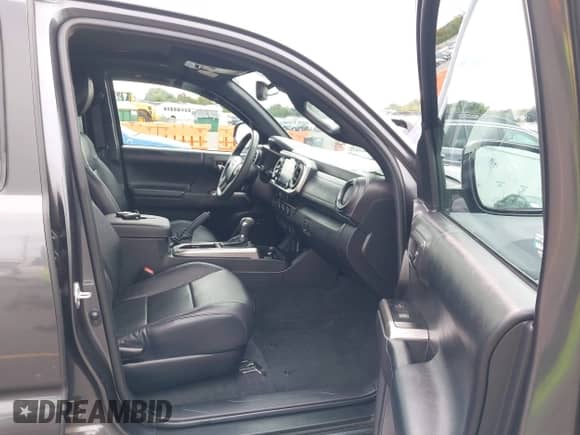 2022 Toyota Tacoma Limited с VIN 3TMGZ5AN6NM507064, выставлен на аукционе IAAI как лот 43210549 с пробегом 37 407 миль миль и . История ставок и продаж доступна на DreamBid. Изображение 5.