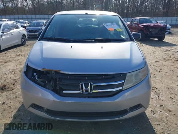 2012 Honda Odyssey LX with VIN 5FNRL5H29CB054971, listed as a IAAI auction lot 41582882 with 261,874 mi miles and . Bid and sale history available at DreamBid. Image 12.