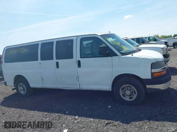 2014 Chevrolet Express Passenger LT with VIN 1GAZG1FG7E1116223, listed as a IAAI auction lot 42600132 with 297,913 mi miles and . Bid and sale history available at DreamBid. Image 13.