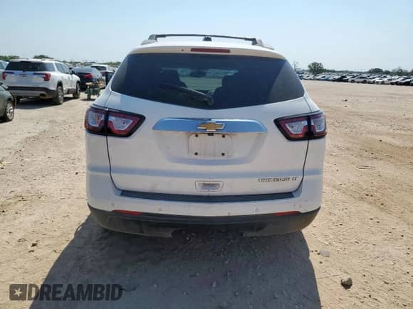 2016 Chevrolet Traverse LT z VIN 1GNKRGKD3GJ242784, wystawiony jako Copart lot #68963925 z przebiegiem Nie podano mil oraz Szkoda całkowita • Salvage title. Historia ofert i sprzedaży dostępna na DreamBid. Obrazek 6.