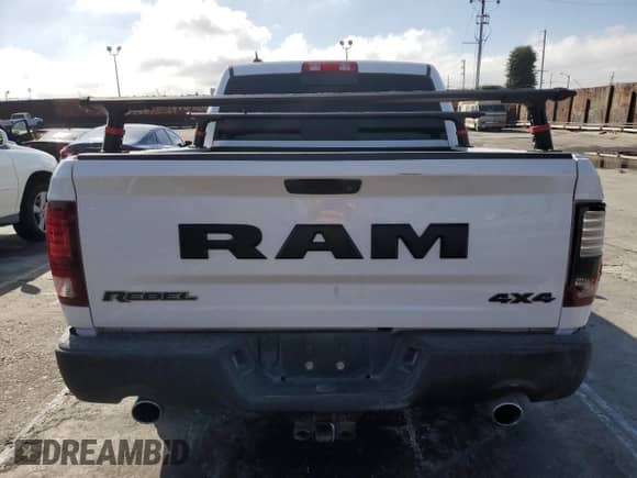 2018 Ram 1500 Rebel с VIN 1C6RR7YT7JS235965, выставлен на аукционе Copart как лот 56193005 с пробегом 61 485 миль миль и Списание • Salvage title. История ставок и продаж доступна на DreamBid. Изображение 6.