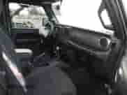 2022 Jeep Wrangler Sport S with VIN 1C4GJXAGXNW258207, listed as a IAAI auction lot 41805545 with 15,388 mi miles and . Bid and sale history available at DreamBid. Image 5.