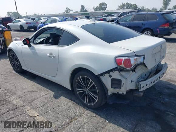 2015 Scion FR-S z VIN JF1ZNAA12F8713987, wystawiony jako IAAI lot #42347851 z przebiegiem 98 629 mil mil oraz . Historia ofert i sprzedaży dostępna na DreamBid. Obrazek 3.