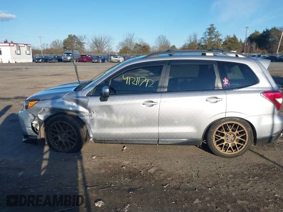 2016 Subaru Forester XT Touring z VIN JF2SJGXCXGH482715, wystawiony jako IAAI lot #41211792 z przebiegiem 95 610 mil mil oraz . Historia ofert i sprzedaży dostępna na DreamBid. Obrazek 14.