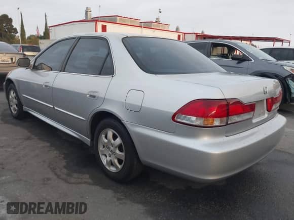 2002 Honda Accord EX with VIN JHMCG66092C013154, listed as a IAAI auction lot 43206234 with 243,021 mi miles and . Bid and sale history available at DreamBid. Image 3.