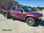 2002 Dodge Dakota SLT with VIN 1B7HL48N02S596767, listed as a Copart auction lot 44758185 with 237,644 mi miles and Clean title. Bid and sale history available at DreamBid. Image 4.