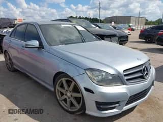 2014 Mercedes-Benz C 250 Sport with VIN WDDGF4HB4EG245351, listed as a IAAI auction lot 43408611 with 133,905 mi miles and . Bid and sale history available at DreamBid. Image 1.
