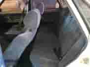 1991 Toyota Camry z VIN 4T1VV21E8MU050409, wystawiony jako Copart lot #61379824 z przebiegiem 100 949 mil mil oraz Nie do naprawy • Non repairable. Historia ofert i sprzedaży dostępna na DreamBid. Obrazek 10.