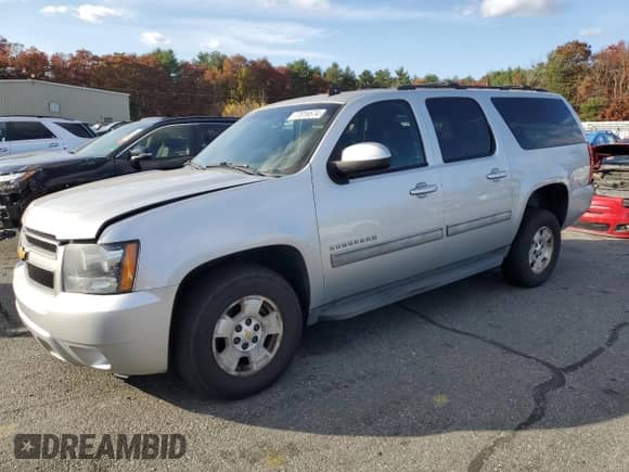 2013 Chevrolet Suburban LS with VIN 1GNSKHE76DR182853, listed as a Copart auction lot 77816574 with 232,842 mi miles and Clean title. Bid and sale history available at DreamBid. Image 1.