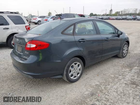 2011 Ford Fiesta SE z VIN 3FADP4BJ6BM165924, wystawiony jako IAAI lot #43260367 z przebiegiem 165 752 mil mil oraz . Historia ofert i sprzedaży dostępna na DreamBid. Obrazek 4.