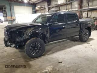 2021 Toyota Tacoma Limited with VIN 3TMGZ5ANXMM430133, listed as a Copart auction lot 57884415 with 36,650 mi miles and Salvage title. Bid and sale history available at DreamBid. Image 1.