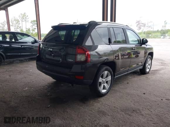 2014 Jeep Compass Latitude with VIN 1C4NJCEB5ED691041, listed as a IAAI auction lot 43112471 with 117,596 mi miles and . Bid and sale history available at DreamBid. Image 4.