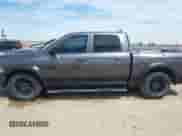 2017 Ram 1500 Rebel z VIN 1C6RR7YT9HS850883, wystawiony jako IAAI lot #42140271 z przebiegiem 100 061 mil mil oraz . Historia ofert i sprzedaży dostępna na DreamBid. Obrazek 14.