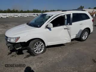2014 Dodge Journey SXT with VIN 3C4PDCBG4ET296732, listed as a Copart auction lot 67479975 with 244,286 mi miles and Salvage title. Bid and sale history available at DreamBid. Image 1.