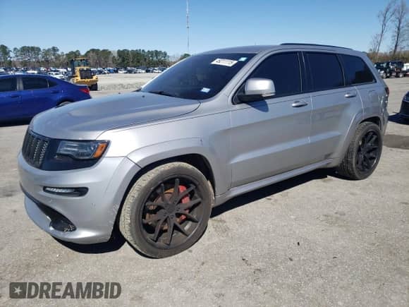 2016 Jeep Grand Cherokee SRT с VIN 1C4RJFDJ9GC358233, выставлен на аукционе Copart как лот 49211115 с пробегом 124 511 миль миль и Списание • Salvage title. История ставок и продаж доступна на DreamBid. Изображение 1.