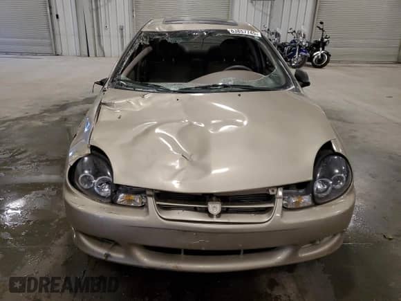 2002 Dodge Neon ES with VIN 1B3ES56C82D594834, listed as a Copart auction lot 63857745 with 100,094 mi miles and Salvage title. Bid and sale history available at DreamBid. Image 5.