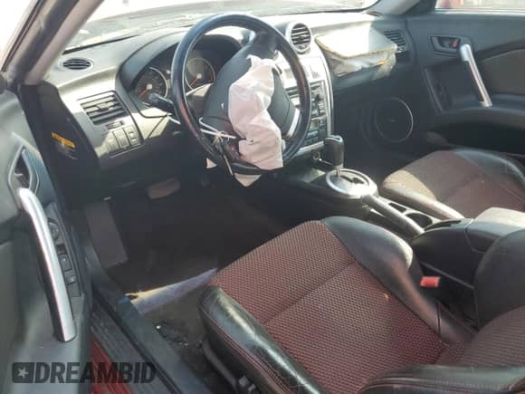 2006 Hyundai Tiburon GT с VIN KMHHN65FX6U190598, выставлен на аукционе Copart как лот 61143675 с пробегом Не указан миль и Списание • Salvage title. История ставок и продаж доступна на DreamBid. Изображение 8.
