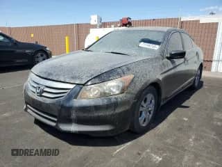 2012 Honda Accord SE z VIN 1HGCP2F65CA104399, wystawiony jako Copart lot #71148755 z przebiegiem 210 703 mil mil oraz Szkoda całkowita • Salvage title. Historia ofert i sprzedaży dostępna na DreamBid. Obrazek 1.