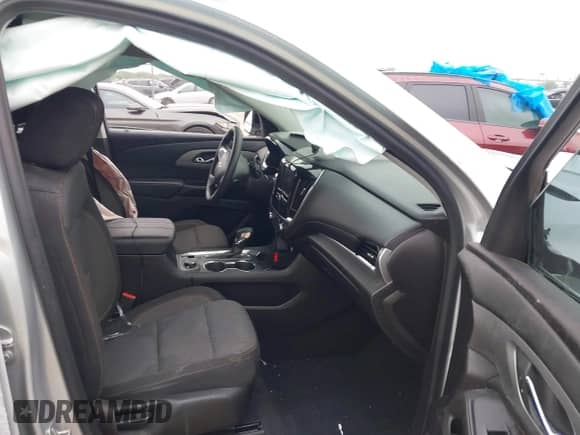 2021 Chevrolet Traverse LS z VIN 1GNERFKW1MJ254095, wystawiony jako IAAI lot #42336687 z przebiegiem Nie podano mil oraz . Historia ofert i sprzedaży dostępna na DreamBid. Obrazek 5.