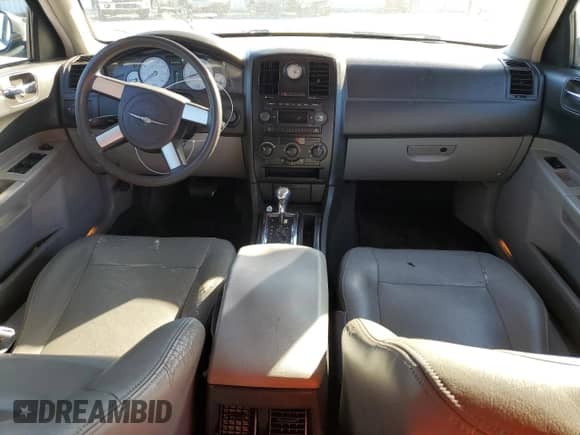 2006 Chrysler 300 with VIN 2C3KA43R46H388656, listed as a Copart auction lot 82635565 with 309,784 mi miles and Salvage title. Bid and sale history available at DreamBid. Image 8.