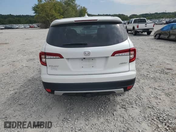 2020 Honda Pilot EX-L z VIN 5FNYF6H50LB060421, wystawiony jako Copart lot #80111525 z przebiegiem 58 305 mil mil oraz Szkoda całkowita • Salvage title. Historia ofert i sprzedaży dostępna na DreamBid. Obrazek 6.