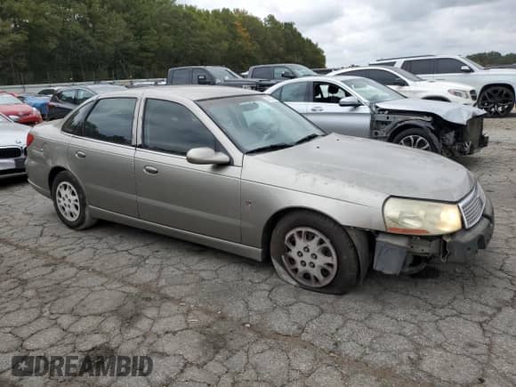 2003 Saturn LS с VIN 1G8JU54F13Y513052, выставлен на аукционе Copart как лот 78123234 с пробегом 244 045 миль миль и Списание • Salvage title. История ставок и продаж доступна на DreamBid. Изображение 4.