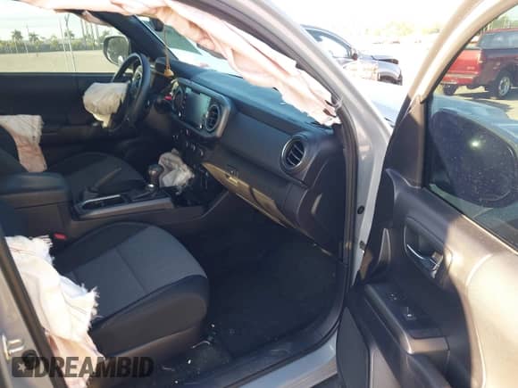 2021 Toyota Tacoma SR5 with VIN 5TFAZ5CN2MX096998, listed as a IAAI auction lot 41788306 with 45,880 mi miles and . Bid and sale history available at DreamBid. Image 5.