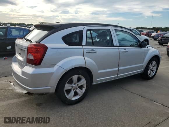2012 Dodge Caliber SXT с VIN 1C3CDWDA5CD533597, выставлен на аукционе Copart как лот 73834484 с пробегом 94 908 миль миль и Списание • Salvage title. История ставок и продаж доступна на DreamBid. Изображение 3.