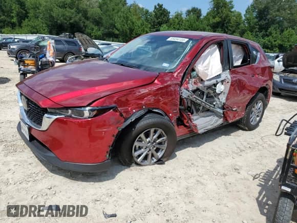 2022 Mazda CX-5 S Select with VIN JM3KFBBM8N0570751, listed as a Copart auction lot 69494155 with 38,438 mi miles and Salvage title. Bid and sale history available at DreamBid. Image 1.