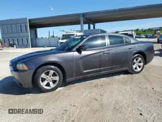 2014 Dodge Charger SE with VIN 2C3CDXBG8EH173759, listed as a Copart auction lot 65875005 with 190,906 mi miles and Clean title. Bid and sale history available at DreamBid. Image 1.