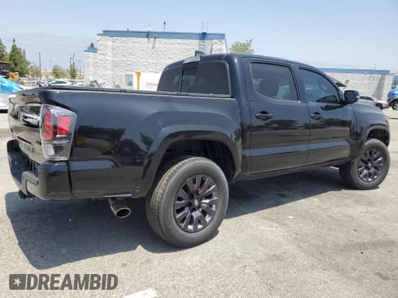 2021 Toyota Tacoma Limited with VIN 3TYGZ5AN8MT038529, listed as a Copart auction lot 58527975 with 46,147 mi miles and Salvage title. Bid and sale history available at DreamBid. Image 3.