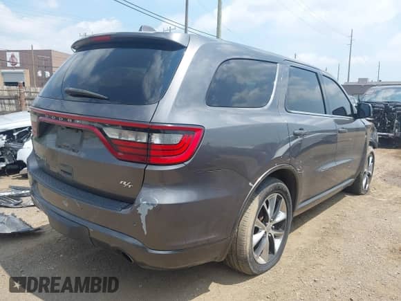2014 Dodge Durango R/T with VIN 1C4SDJCT6EC305081, listed as a IAAI auction lot 42685366 with 195,544 mi miles and . Bid and sale history available at DreamBid. Image 4.