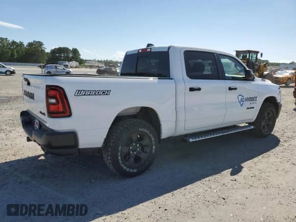 2025 Ram 1500 Warlock with VIN 1C6SRFGP1SN702488, listed as a Copart auction lot 57148285 with 1,183 mi miles and Salvage title. Bid and sale history available at DreamBid. Image 3.
