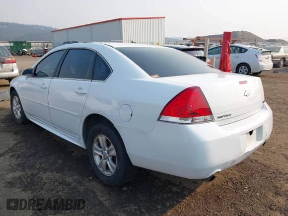2013 Chevrolet Impala LS with VIN 2G1WF5E35D1240348, listed as a IAAI auction lot 43131336 with 137,558 mi miles and . Bid and sale history available at DreamBid. Image 3.