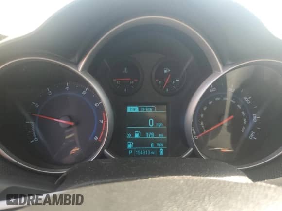 2014 Chevrolet Cruze 2LT z VIN 1G1PE5SB7E7134961, wystawiony jako Copart lot #80958165 z przebiegiem 154 313 mil mil oraz Szkoda całkowita • Salvage title. Historia ofert i sprzedaży dostępna na DreamBid. Obrazek 9.