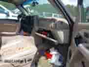 2003 Chevrolet Suburban LT with VIN 1GNEC16Z13J197680, listed as a IAAI auction lot 42558001 with Not provided miles and . Bid and sale history available at DreamBid. Image 5.