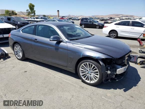 2016 BMW 4 Series 428i xDrive with VIN WBA3N9C53GK249897, listed as a Copart auction lot 65615275 with 94,394 mi miles and Salvage title. Bid and sale history available at DreamBid. Image 4.