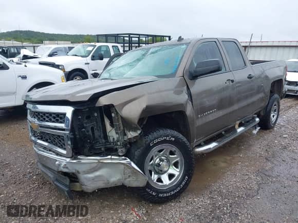 2014 Chevrolet Silverado 1500 Work Truck z VIN 1GCRCPEH7EZ380639, wystawiony jako IAAI lot #43088985 z przebiegiem Nie podano mil oraz . Historia ofert i sprzedaży dostępna na DreamBid. Obrazek 2.
