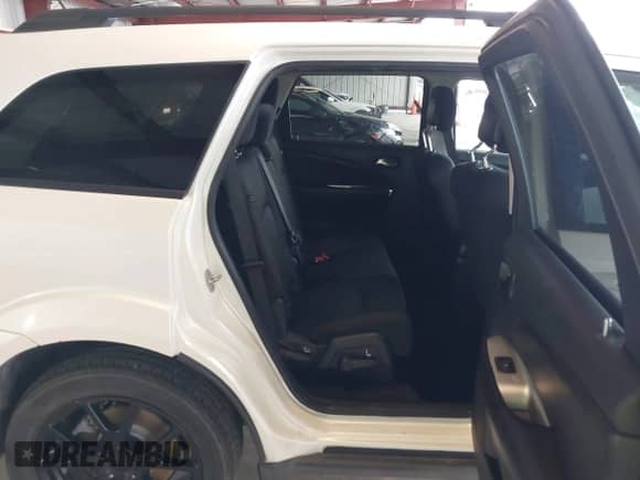 2013 Dodge Journey SXT with VIN 3C4PDCBB3DT661615, listed as a IAAI auction lot 43455375 with 99,763 mi miles and . Bid and sale history available at DreamBid. Image 8.