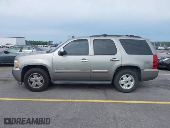 2009 Chevrolet Tahoe 2LT with VIN 1GNEC23379R171830, listed as a IAAI auction lot 42301426 with 254,065 mi miles and . Bid and sale history available at DreamBid. Image 14.