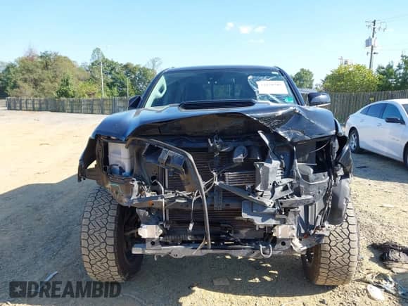 2020 Toyota Tacoma SR5 with VIN 3TMCZ5AN0LM331088, listed as a IAAI auction lot 43270787 with 69,590 mi miles and . Bid and sale history available at DreamBid. Image 6.