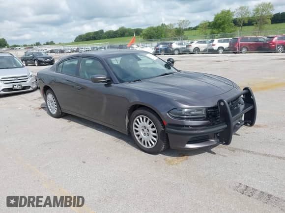 2020 Dodge Charger Police z VIN 2C3CDXKT4LH120180, wystawiony jako IAAI lot #42834441 z przebiegiem 128 459 mil mil oraz . Historia ofert i sprzedaży dostępna na DreamBid. Obrazek 1.