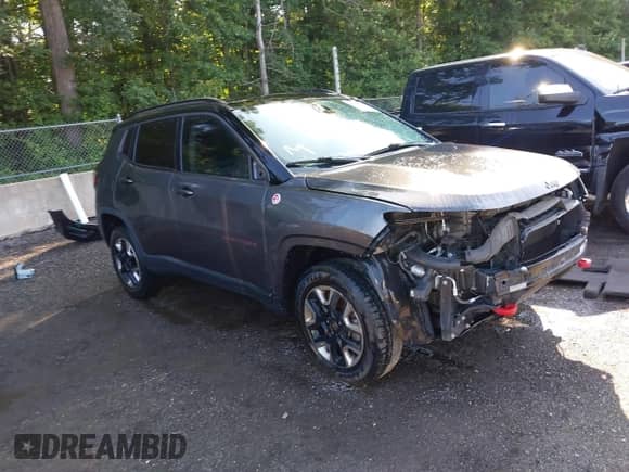 2018 Jeep Compass Trailhawk z VIN 3C4NJDDB8JT343455, wystawiony jako IAAI lot #42545545 z przebiegiem 90 515 mil mil oraz . Historia ofert i sprzedaży dostępna na DreamBid. Obrazek 1.