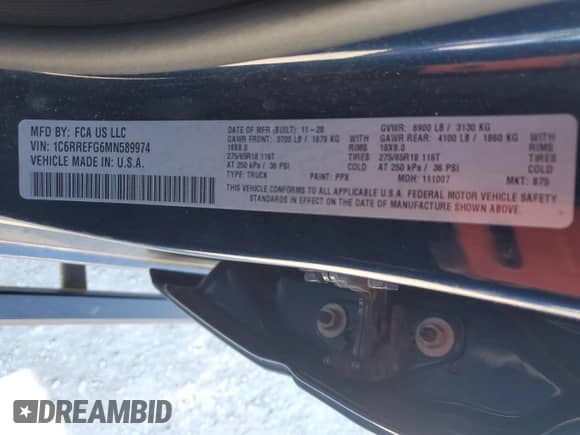 2021 Ram 1500 Big Horn with VIN 1C6RREFG6MN589974, listed as a Copart auction lot 82970744 with 43,167 mi miles and Salvage title. Bid and sale history available at DreamBid. Image 13.