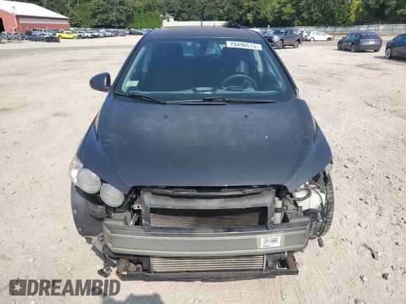 2014 Chevrolet Sonic LT z VIN 1G1JD6SB8E4153079, wystawiony jako Copart lot #70496614 z przebiegiem 153 743 mil mil oraz Czysty tytuł • Clean title. Historia ofert i sprzedaży dostępna na DreamBid. Obrazek 5.