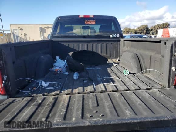 2003 GMC Sierra 1500 SLE z VIN 1GTEK14V23Z254997, wystawiony jako Copart lot #80293904 z przebiegiem 242 384 mil mil oraz Szkoda całkowita • Salvage title. Historia ofert i sprzedaży dostępna na DreamBid. Obrazek 10.
