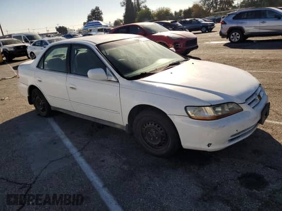 2002 Honda Accord LX с VIN 1HGCG655X2A076954, выставлен на аукционе Copart как лот 81845354 с пробегом Не указан миль и Списание • Salvage title. История ставок и продаж доступна на DreamBid. Изображение 4.