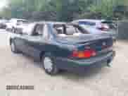 1995 Toyota Camry LE z VIN 4T1SK12E6SU532880, wystawiony jako IAAI lot #42992191 z przebiegiem 210 562 mil mil oraz . Historia ofert i sprzedaży dostępna na DreamBid. Obrazek 3.