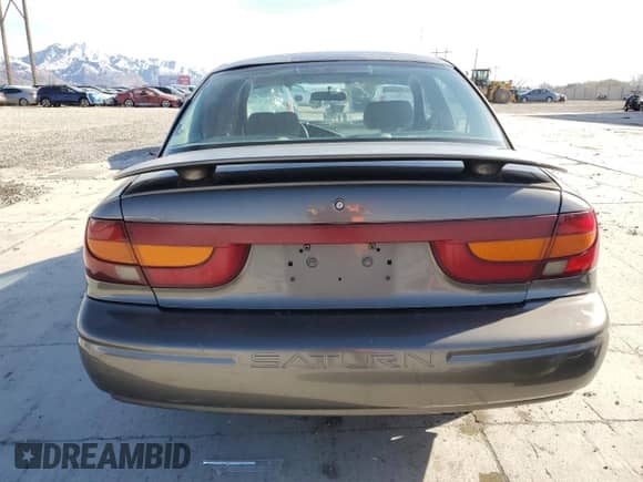 2000 Saturn SL with VIN 1G8ZK5276YZ227493, listed as a Copart auction lot 48172835 with 105,806 mi miles and Salvage title. Bid and sale history available at DreamBid. Image 6.